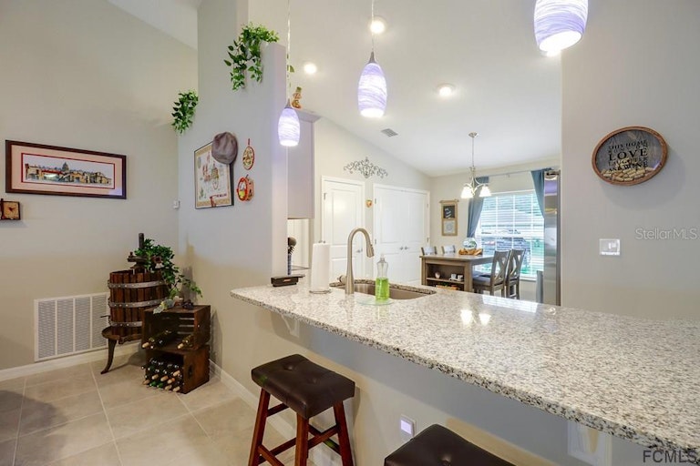 Photo 9 of 40 - 39 Rickenbacker Dr, Palm Coast, FL 32164