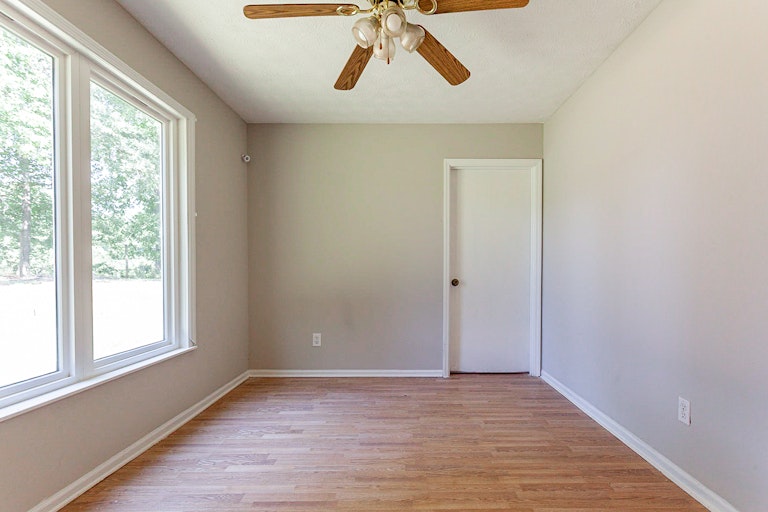 Photo 12 of 26 - 11673 Matthews Trl, Hampton, GA 30228