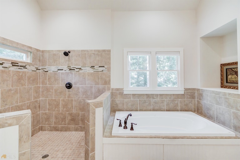 Photo 26 of 51 - 477 Tom Smith Rd SW, Lilburn, GA 30047