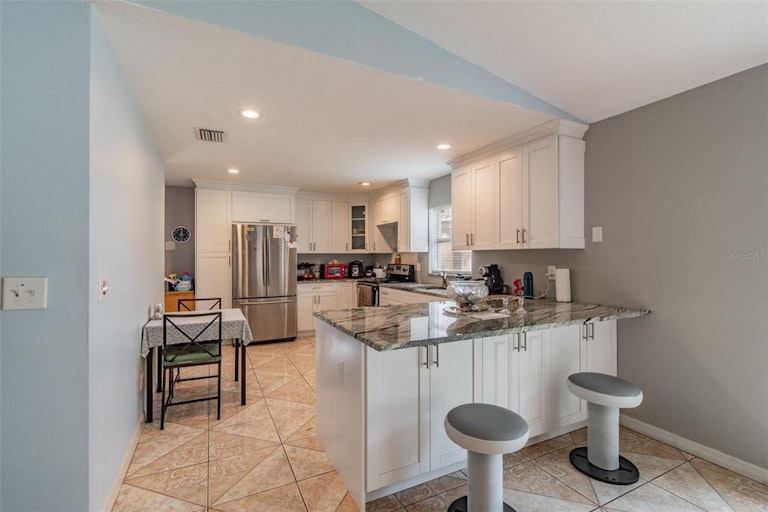 Photo 14 of 40 - 8107 N Lois Ave, Tampa, FL 33614