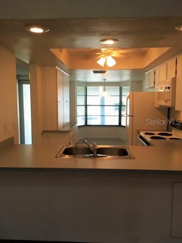 Photo 8 of 23 - 9238 Championship Ln #2, New Port Richey, FL 34655