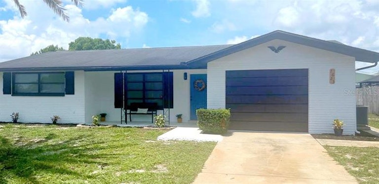 Photo 10 of 48 - 7623 Lotus Dr, Port Richey, FL 34668