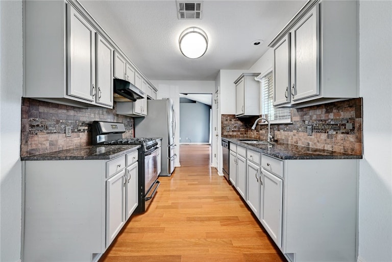 Photo 8 of 25 - 7228 Wardman Dr, Del Valle, TX 78617