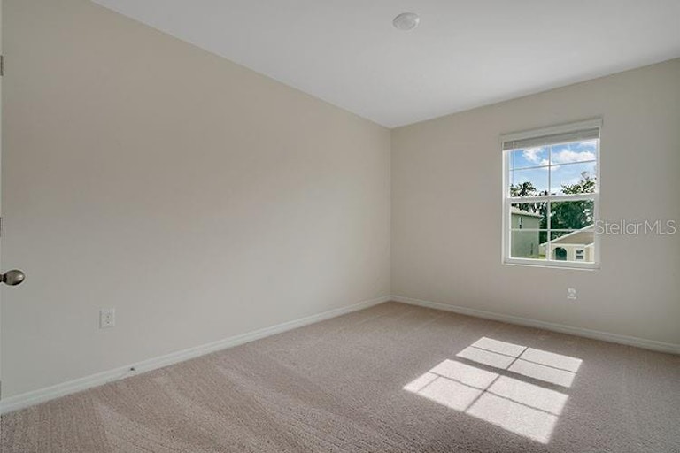 Photo 15 of 19 - 2585 Shamrock St, Tavares, FL 32778