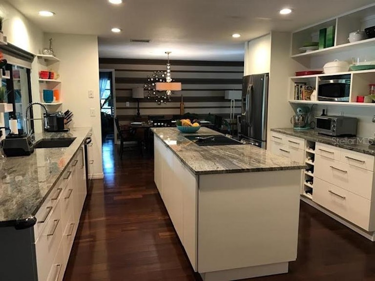Photo 12 of 14 - 5617 Beneva Woods Cir, Sarasota, FL 34233