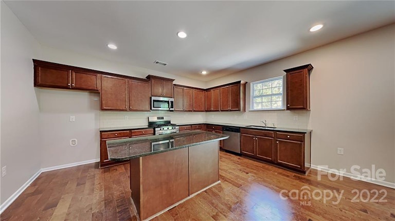 Photo 2 of 9 - 137 Rippling Water Dr, Mount Holly, NC 28120