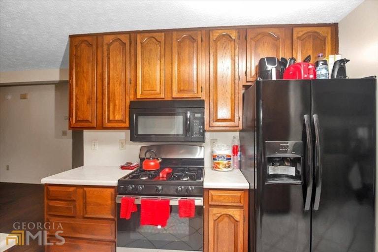 Photo 10 of 22 - 11525 Matthews Trl, Hampton, GA 30228