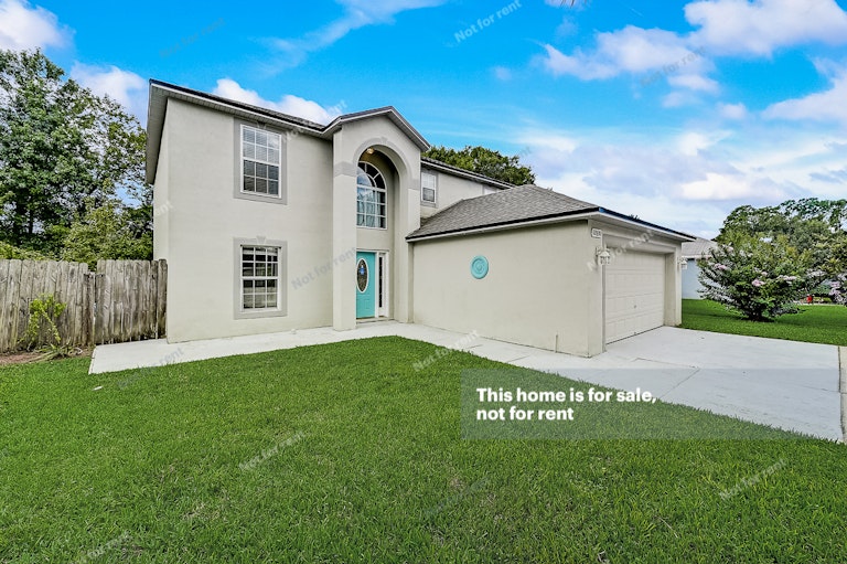 Photo 12 of 35 - 12030 Cobblestone Forest Cir S, Jacksonville, FL 32225