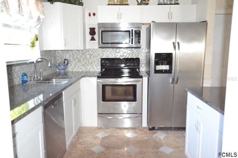 Photo 4 of 22 - 59 Farragut Dr, Palm Coast, FL 32137