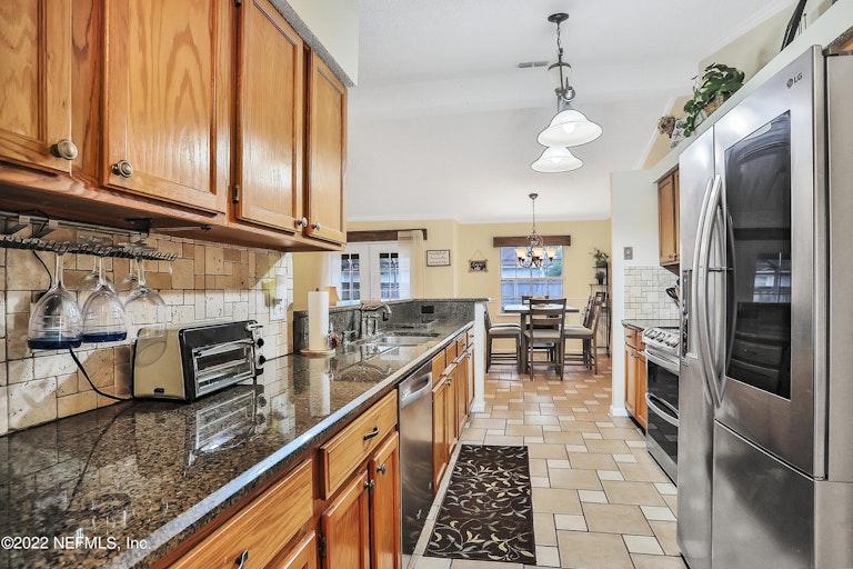 Photo 12 of 36 - 1444 Starboard Ct, Fleming Island, FL 32003