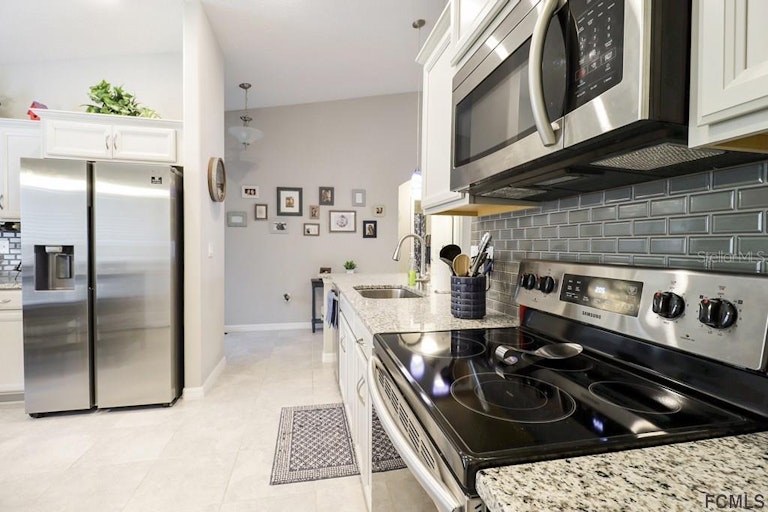 Photo 10 of 40 - 39 Rickenbacker Dr, Palm Coast, FL 32164