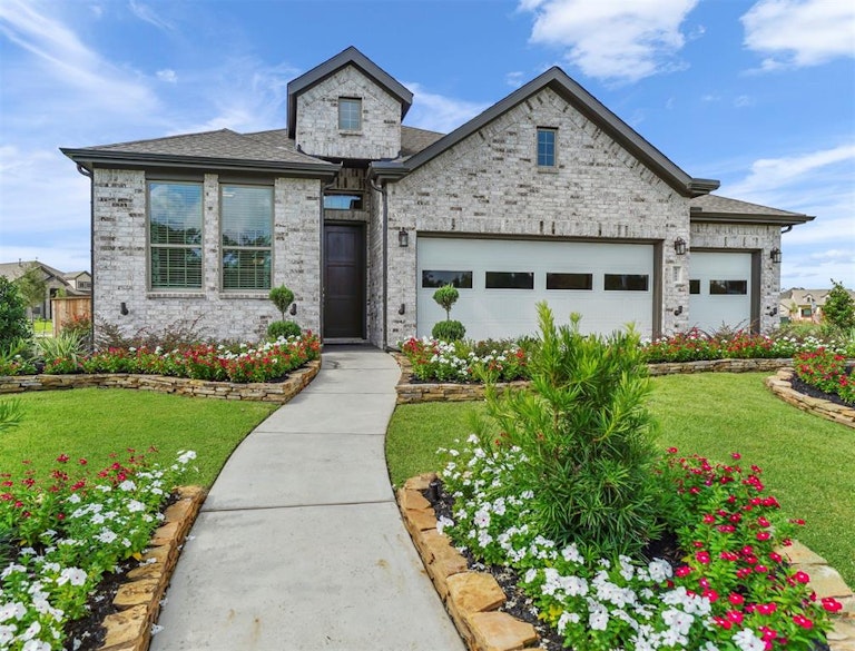 Photo 2 of 30 - 29607 Sterling Knoll Dr, Missouri City, TX 77441