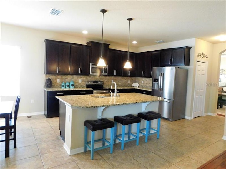 Photo 8 of 24 - 2646 Kenchester Loop, Wesley Chapel, FL 33543