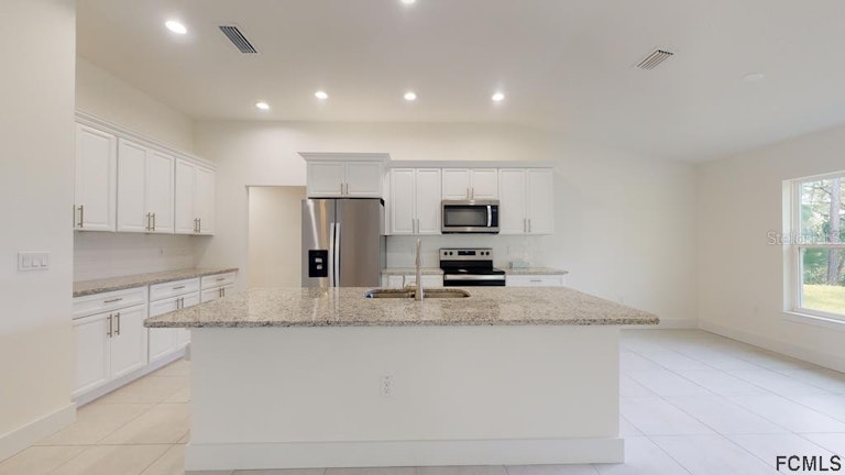 Photo 5 of 35 - 12 Pittman Dr, Palm Coast, FL 32164