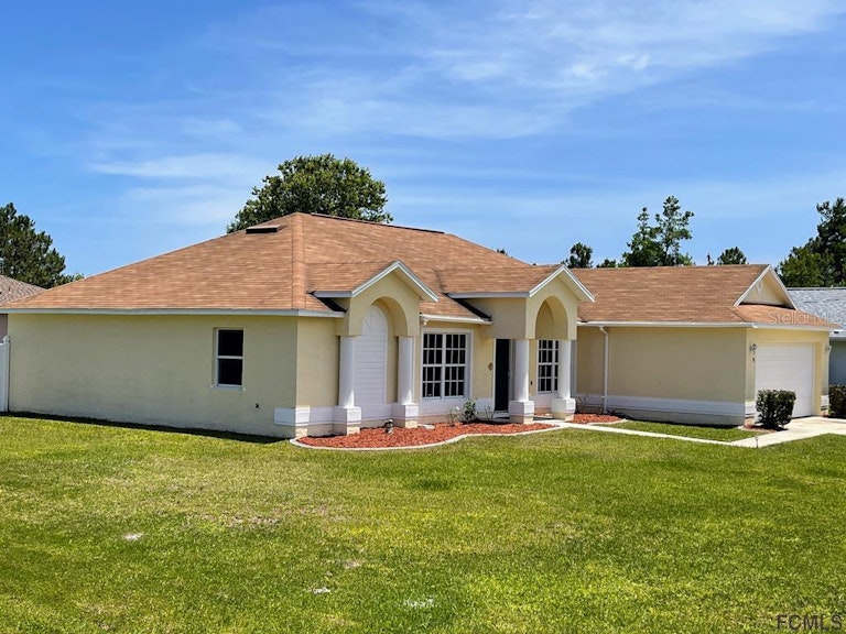 Photo 2 of 8 - 95 Ulaturn Trl, Palm Coast, FL 32164