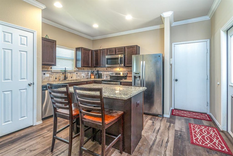 Photo 12 of 29 - 1300 Honeywood Ln, Royse City, TX 75189