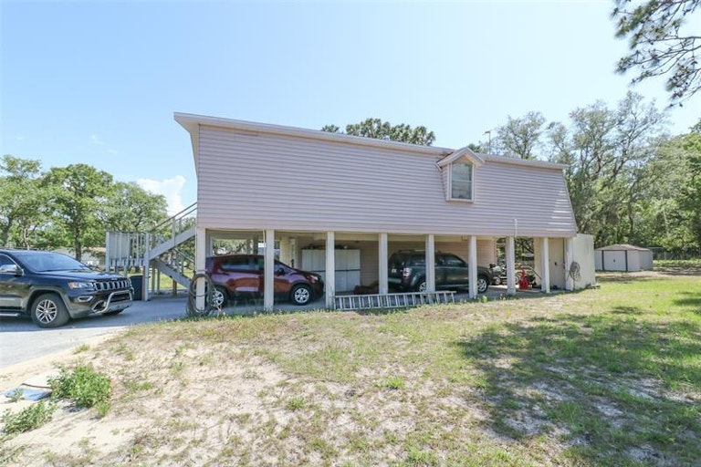 Photo 2 of 21 - 15825 Hicks Rd, Hudson, FL 34667