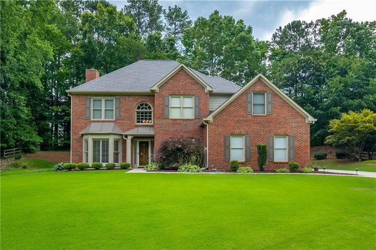 Photo 1 of 24 - 1740 Ivey Walk Ct, Cumming, GA 30041