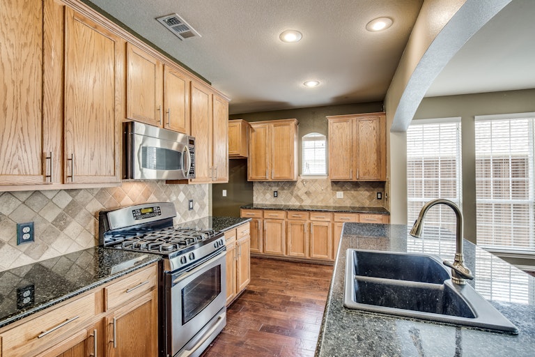 Photo 13 of 31 - 2441 Deerwood Dr, Little Elm, TX 75068