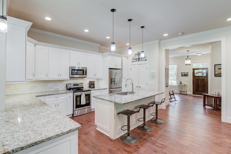 Photo 11 of 51 - 477 Tom Smith Rd SW, Lilburn, GA 30047