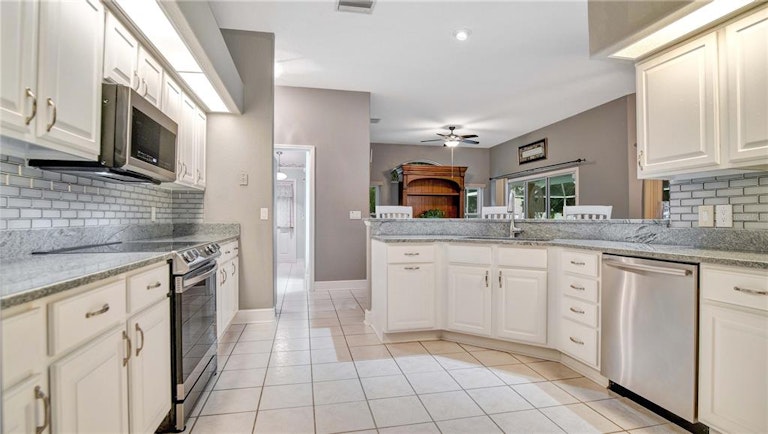 Photo 7 of 37 - 86 Wood Haven Dr, Palm Coast, FL 32164