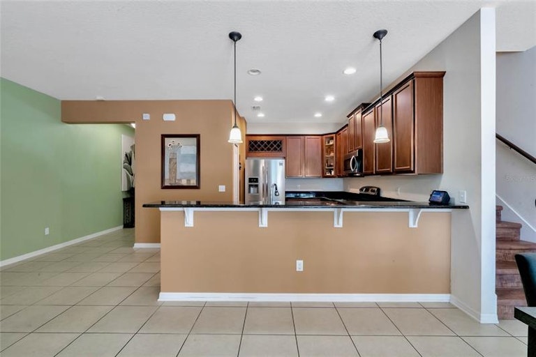 Photo 9 of 28 - 9309 Shepton St, Orlando, FL 32825