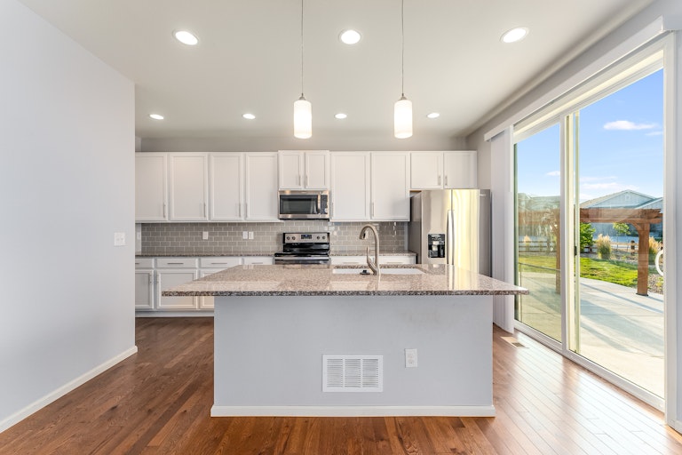 Photo 4 of 19 - 9330 Dunraven St, Arvada, CO 80007