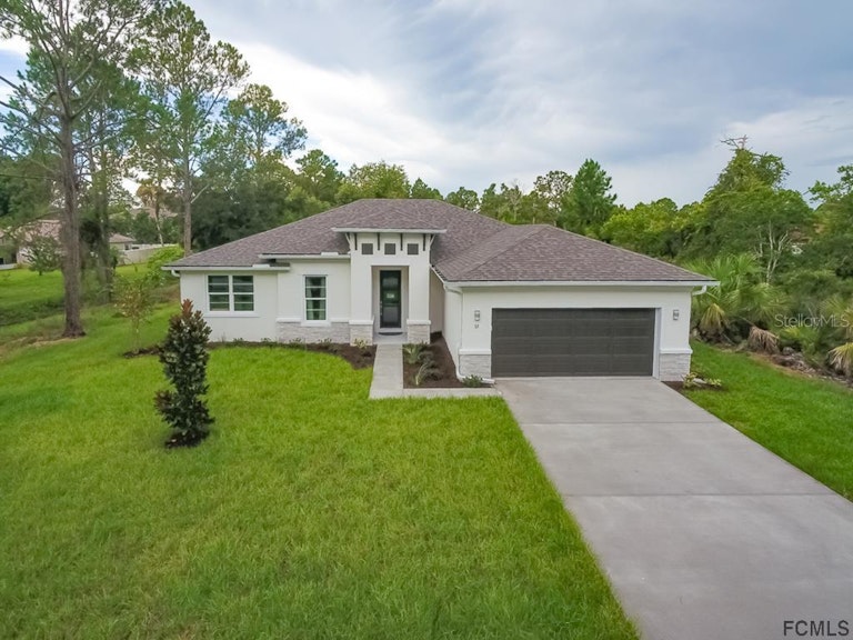 Photo 1 of 10 - 23 Rockingham Ln, Palm Coast, FL 32164
