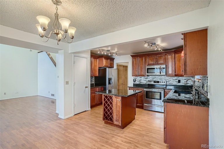 Photo 12 of 28 - 12211 Niagara Ct, Brighton, CO 80602