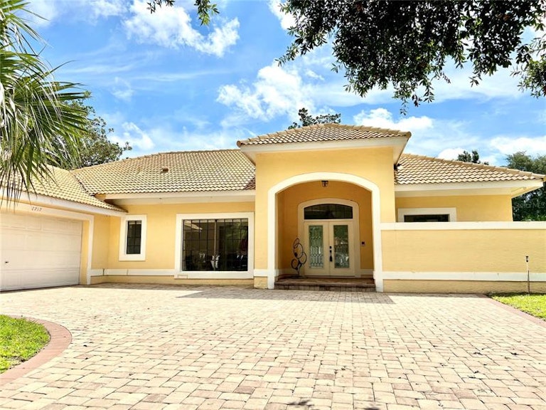 Photo 1 of 25 - 7717 Apple Tree Cir, Orlando, FL 32819