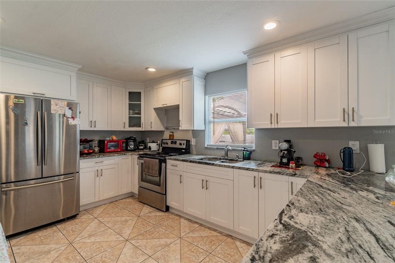Photo 15 of 40 - 8107 N Lois Ave, Tampa, FL 33614