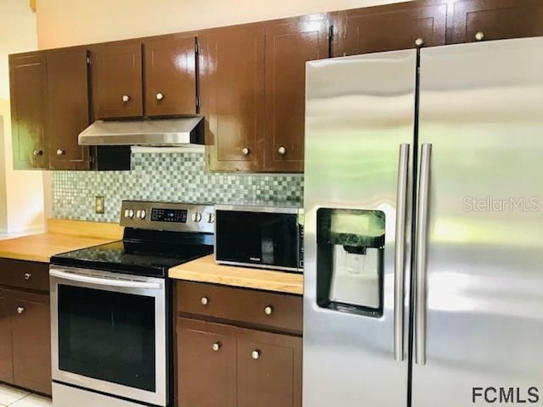 Photo 10 of 26 - 43 Bayside Dr, Palm Coast, FL 32137