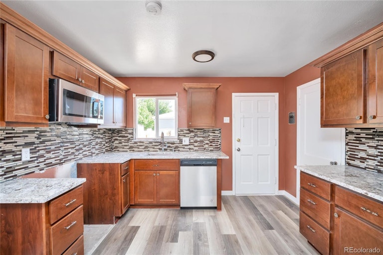 Photo 3 of 15 - 700 Kenton St, Aurora, CO 80010