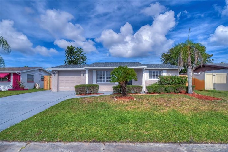 Photo 1 of 49 - 2105 Dartmouth Dr, Holiday, FL 34691
