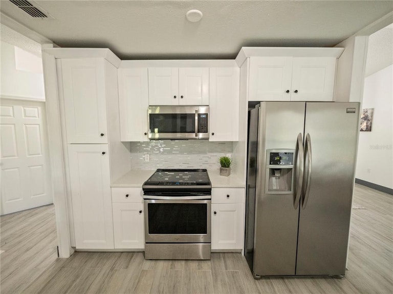 Photo 13 of 38 - 1902 Paragon St, Deltona, FL 32738