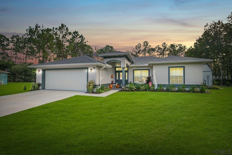 Photo 1 of 32 - 18 Unique Ct, Palm Coast, FL 32164