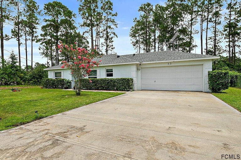 Photo 5 of 39 - 13 Lloshire Path, Palm Coast, FL 32164