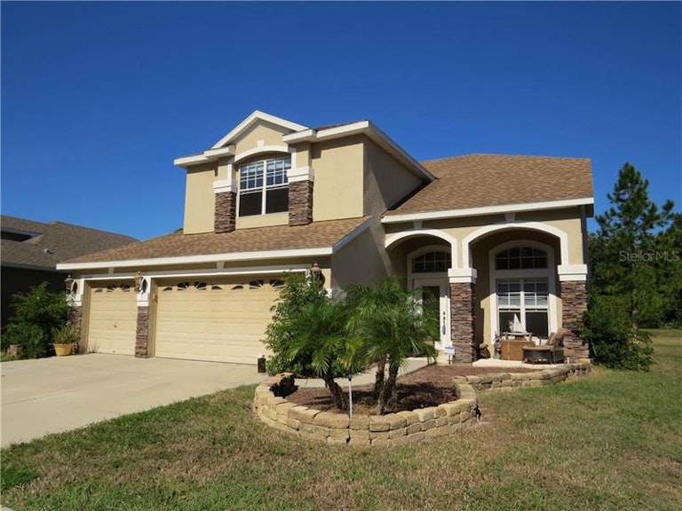 Photo 1 of 24 - 11237 Belle Haven Dr, New Port Richey, FL 34654