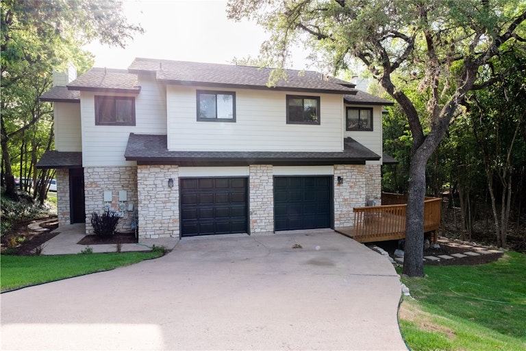 Photo 1 of 32 - 9000 Mountain Ridge Dr, Austin, TX 78759