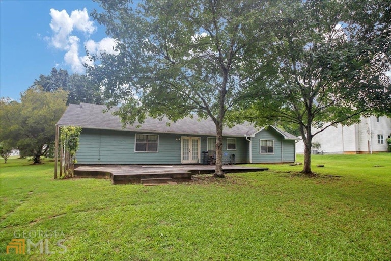 Photo 5 of 22 - 11525 Matthews Trl, Hampton, GA 30228