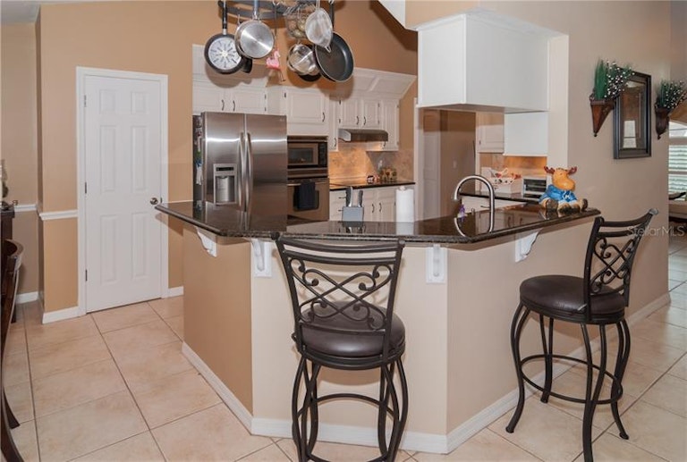 Photo 11 of 25 - 226 Caddie Ct, Debary, FL 32713