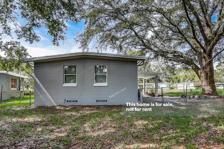 Photo 12 of 29 - 4030 Lockhart Dr N, Jacksonville, FL 32209