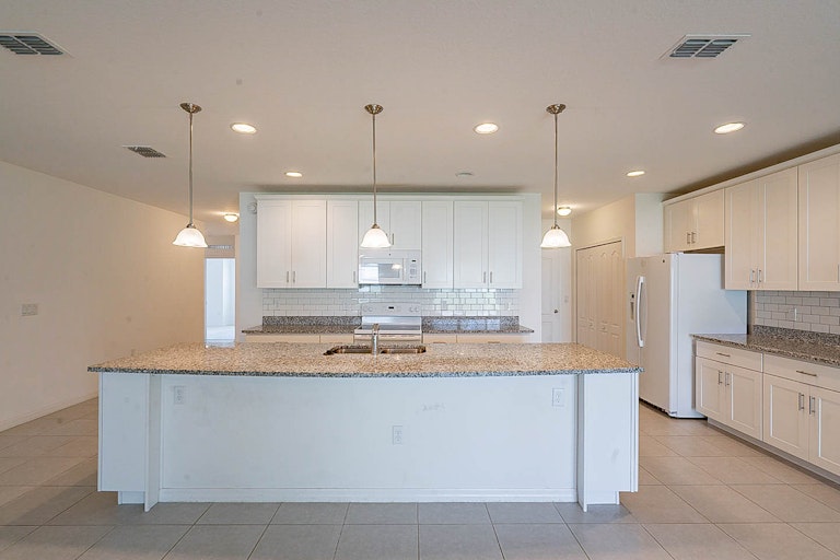 Photo 4 of 30 - 237 Milestone Dr, Haines City, FL 33844