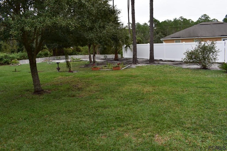 Photo 34 of 35 - 72 Red Mill Dr, Palm Coast, FL 32164