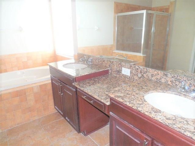 Photo 11 of 25 - 8748 Handel Loop, Land O Lakes, FL 34637