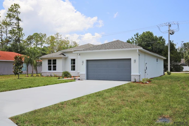 Photo 1 of 24 - 52 Robinson Dr, Palm Coast, FL 32164