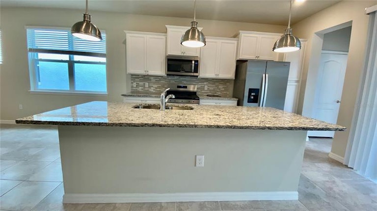 Photo 19 of 64 - 7188 Oakmoss Loop, Davenport, FL 33837