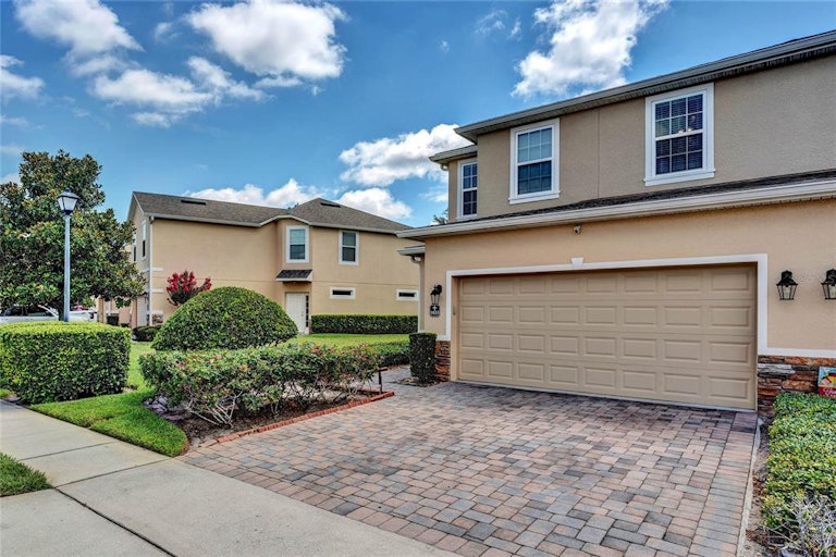 Photo 2 of 36 - 1033 Wood Cv, Kissimmee, FL 34743