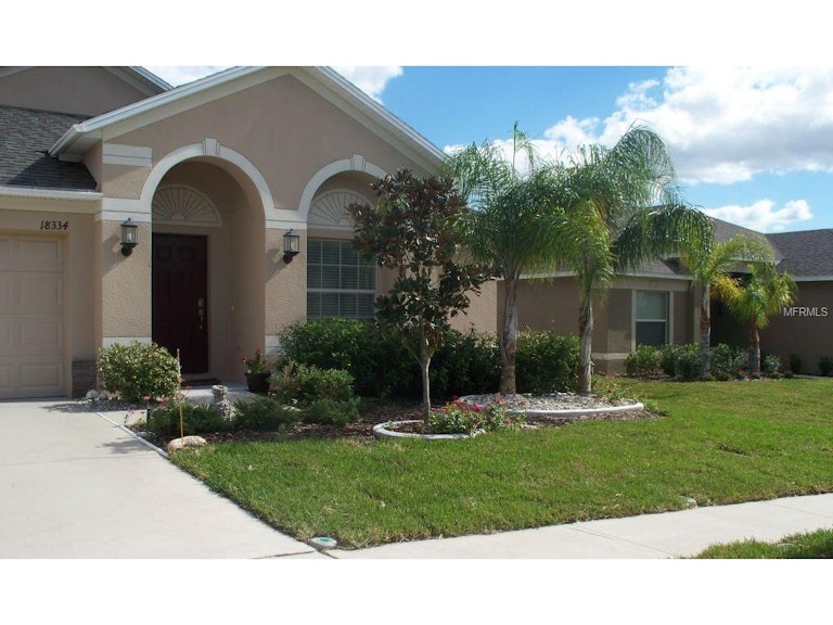 Photo 1 of 25 - 18334 Waydale Loop, Hudson, FL 34667