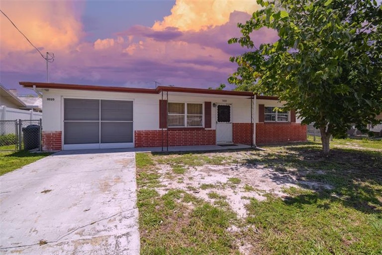 Photo 1 of 27 - 11020 Hassle Ave, Port Richey, FL 34668